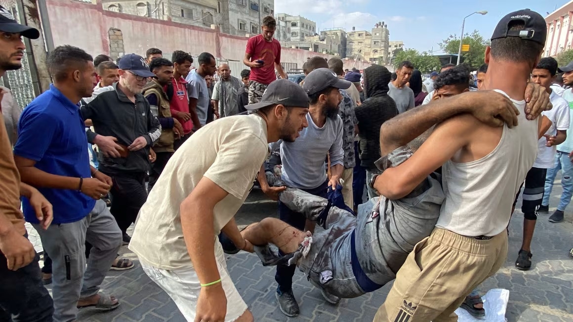 Dozens killed by Israeli fire as they sought desperately needed aid in Gaza, Palestinian health ministry says