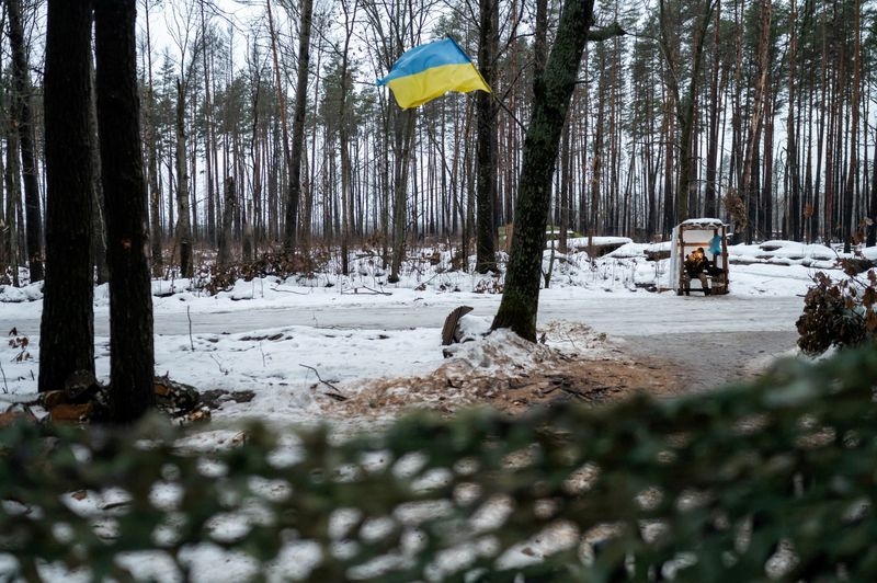 Russia sentences activist who helped Ukrainians flee war to 22 years in prison