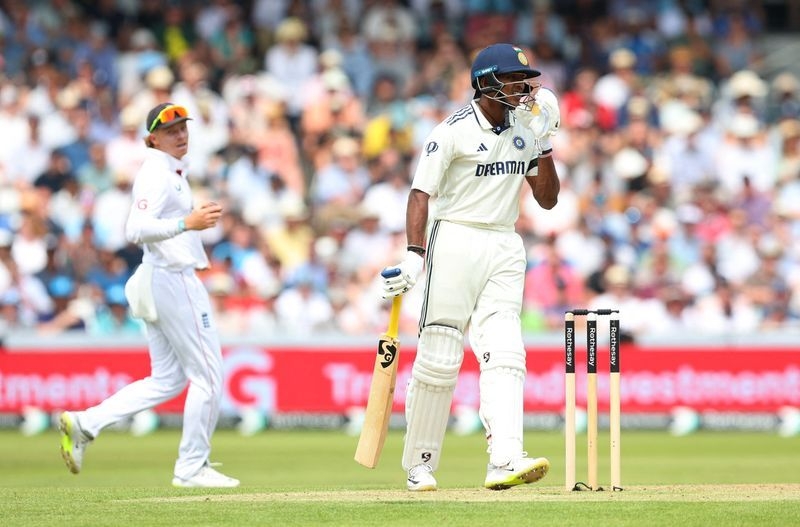 Cricket-Two quick-fire wickets drag England back into opening test just before lunch