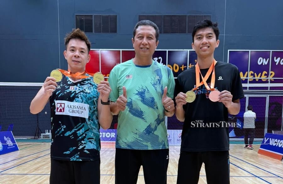Liek Hou battles through pain for two Asian Para badminton titles