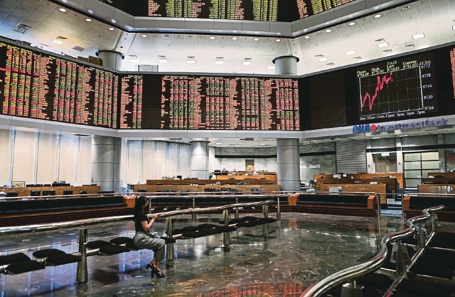 Bursa Malaysia opens marginally higher, turns lower soon after