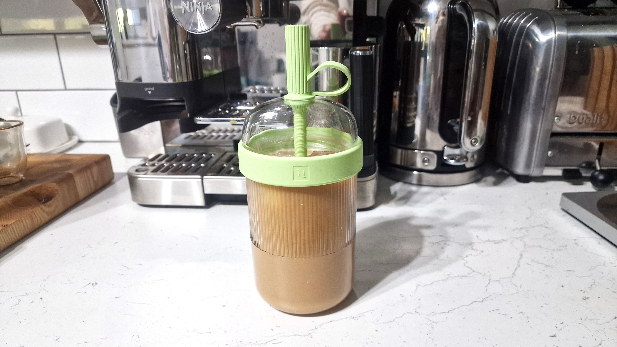 I've been using Nespresso's spill-proof iced coffee cup, and it's the best $25 you'll spend this summer