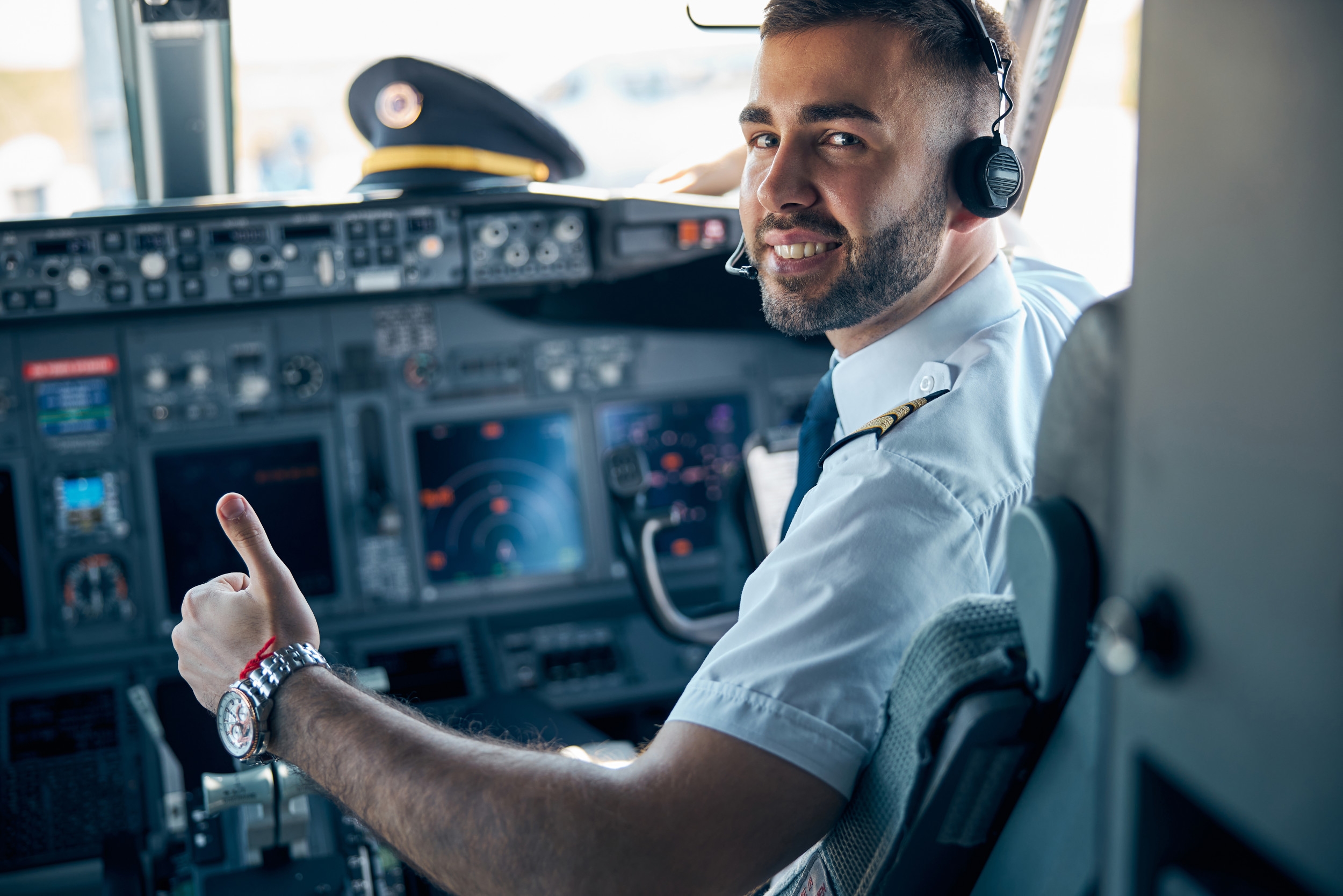 Pilot Reveals What Those 'Dings' You Hear After Takeoff Really Mean