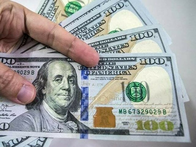 US dollar softens in choppy trade