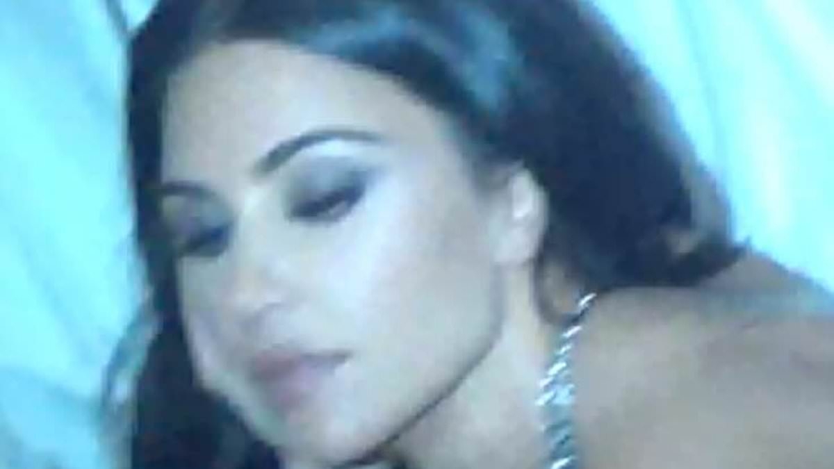 Kim Kardashian goes topless in racy NYC hotel room photos after ex Kanye West crashed Diddy trial