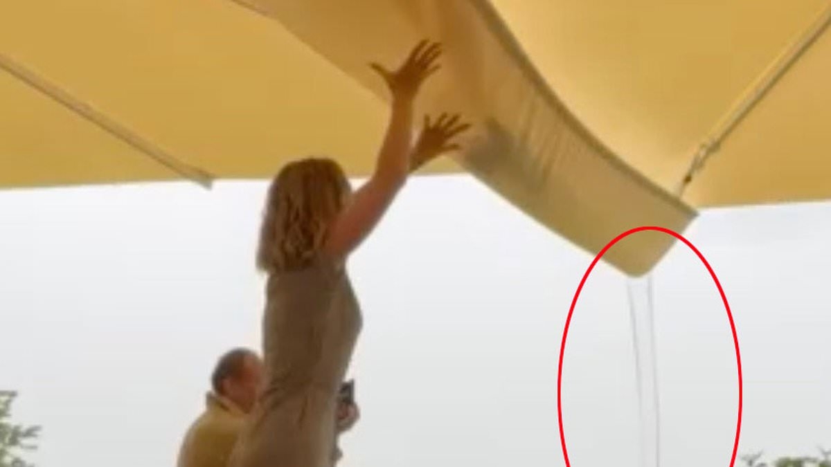 Moment Jeremy Clarkson's controversial £40,000 pub umbrellas SOAK the decking at The Farmer's Dog pub