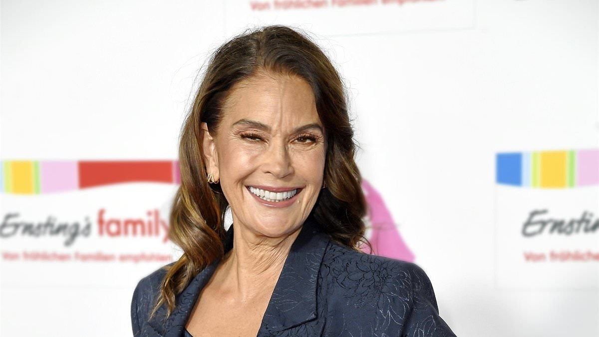 Teri Hatcher, 60, displays her VERY taut skin as she attends Ernsting's family fashion show in Hamburg