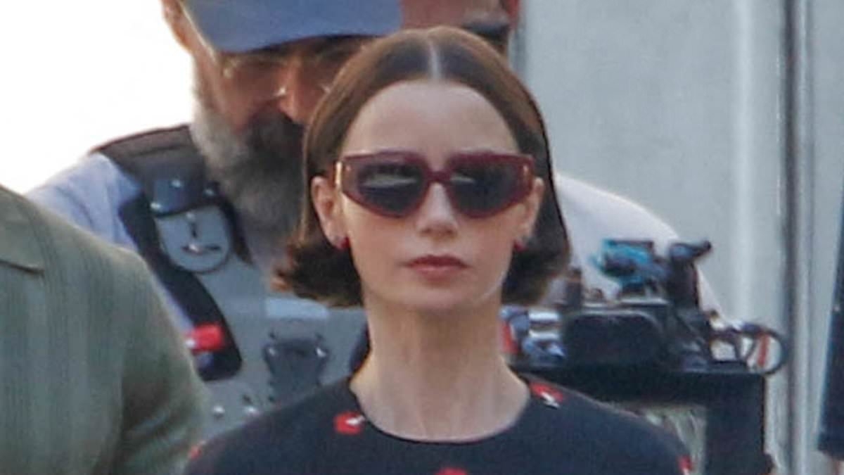 Lily Collins looks as chic as ever in a fitted midi dress as she films scenes for fifth season of Emily in Paris