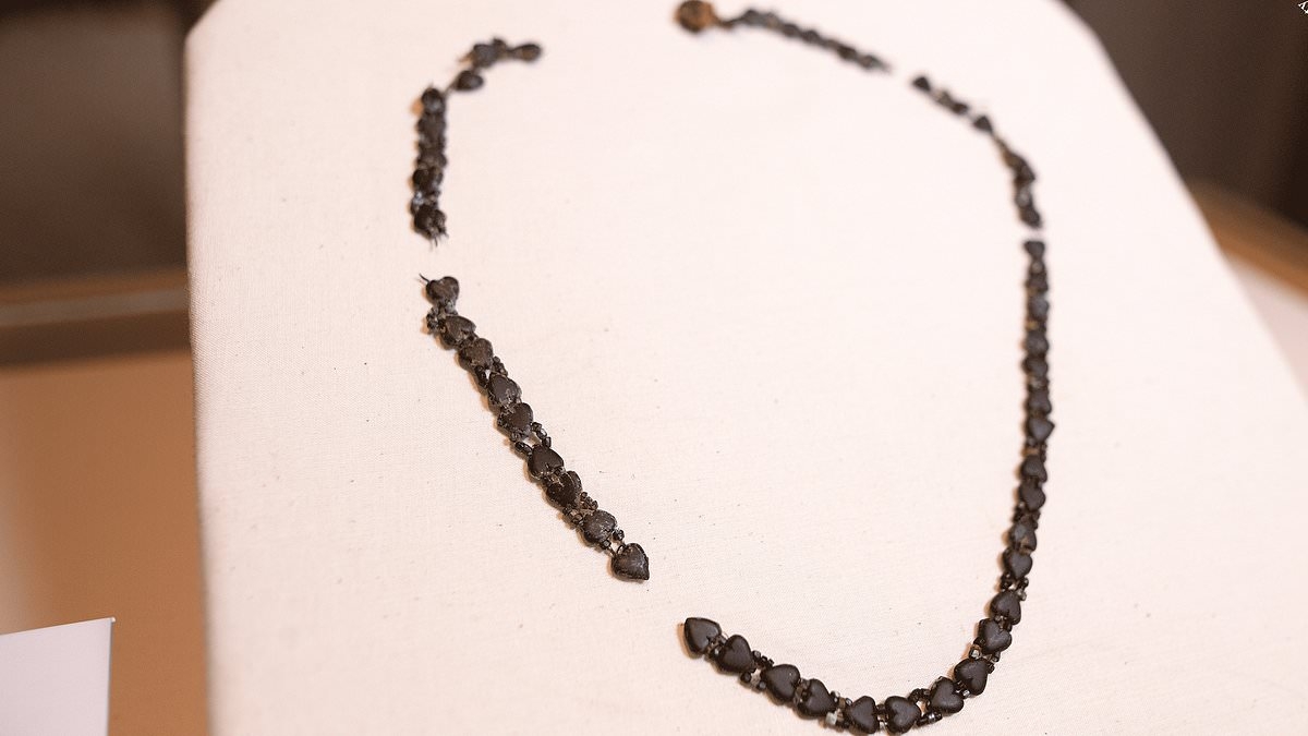 The Titanic gives up its forgotten treasures: Lost black glass necklace is recovered from the shipwreck after nearly a century underwater