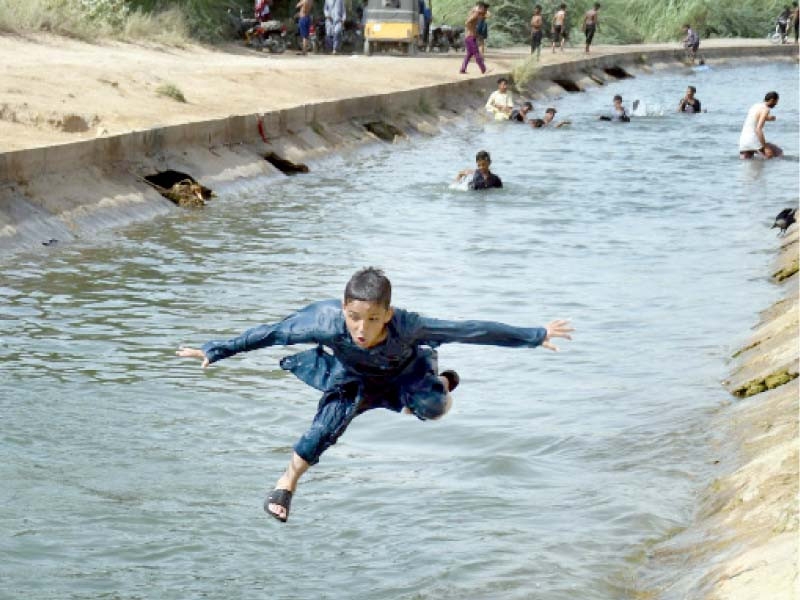 13 held for swimming in canal
