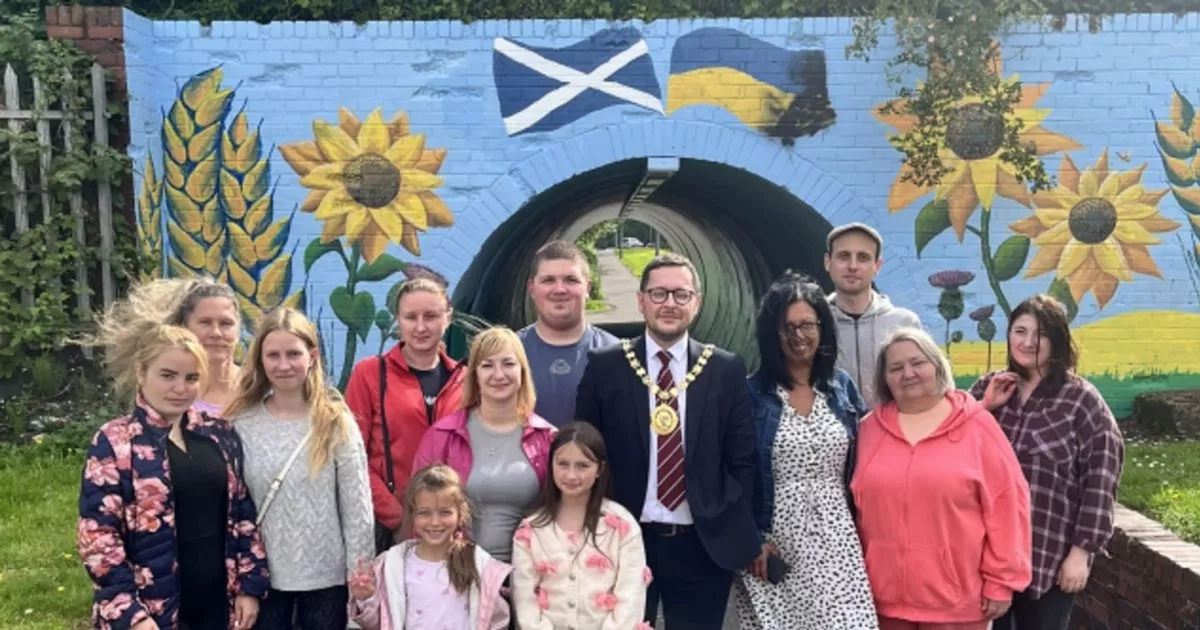 Councillors visit stunning new mural in Wishaw created by Ukrainian refugees