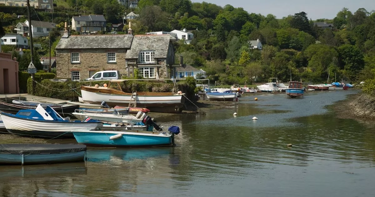 Picturesque village where house prices are being slashed by £100K because of tax rises