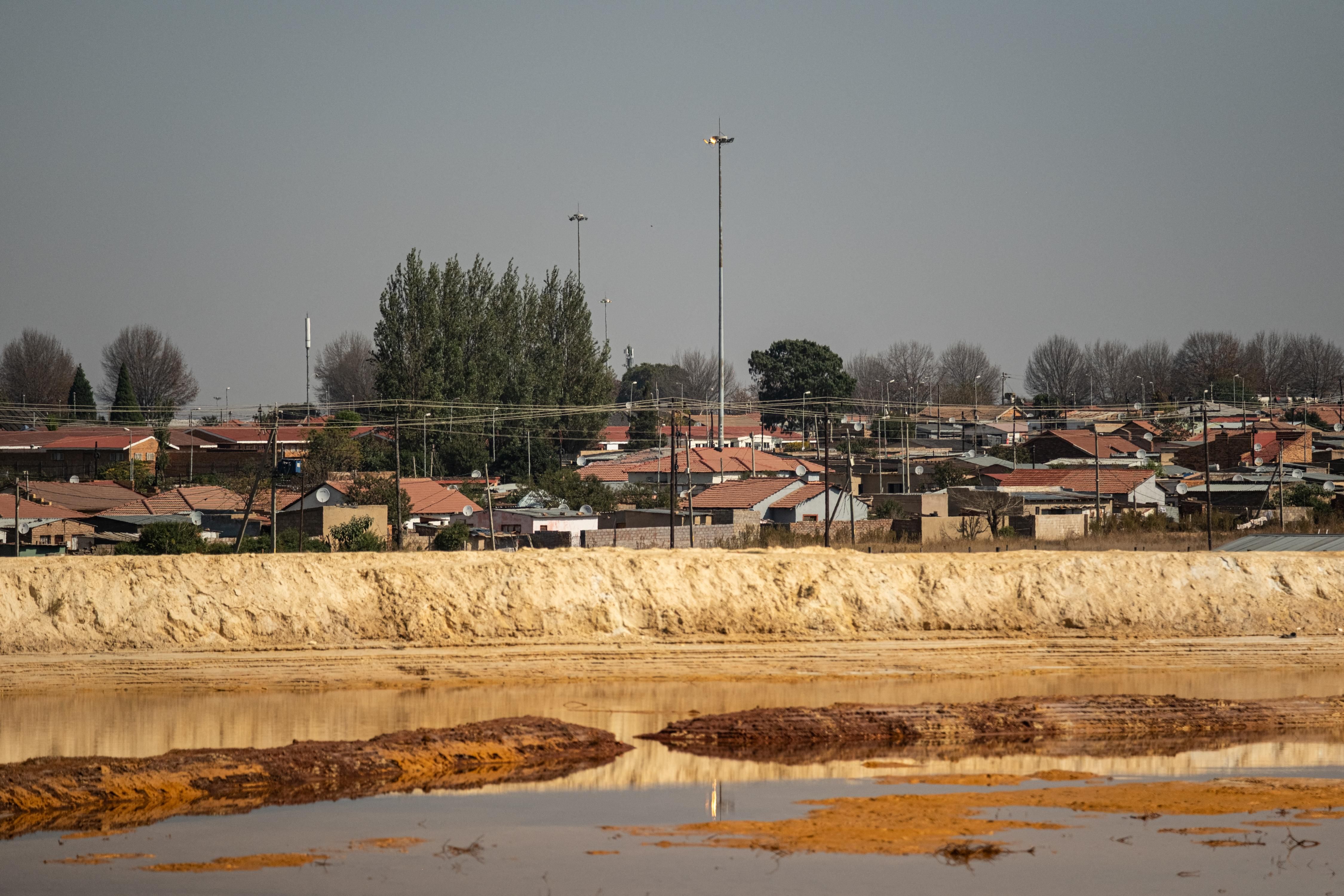 South Africa's gold mining past poisons Soweto community, residents say