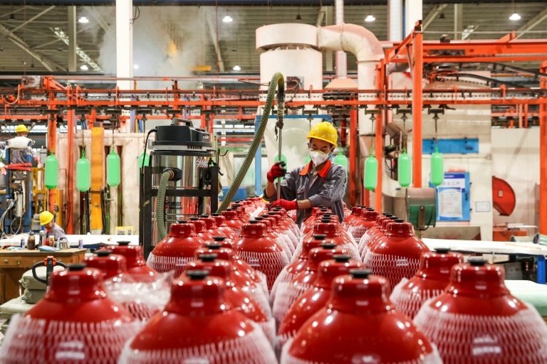 China factory output slumps but consumption offers bright spot