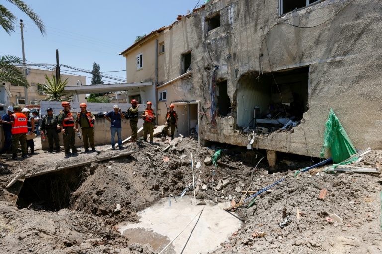 Israeli building hit in wave of drone attacks: rescue services