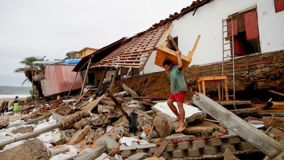 Erick makes landfall as a Category 3 hurricane, the strongest to hit Mexico so early in the year