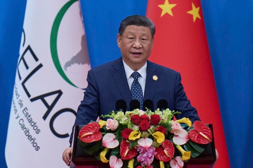 Two foreign nationals charged with stalking a Los Angeles artist who criticized Xi Jinping