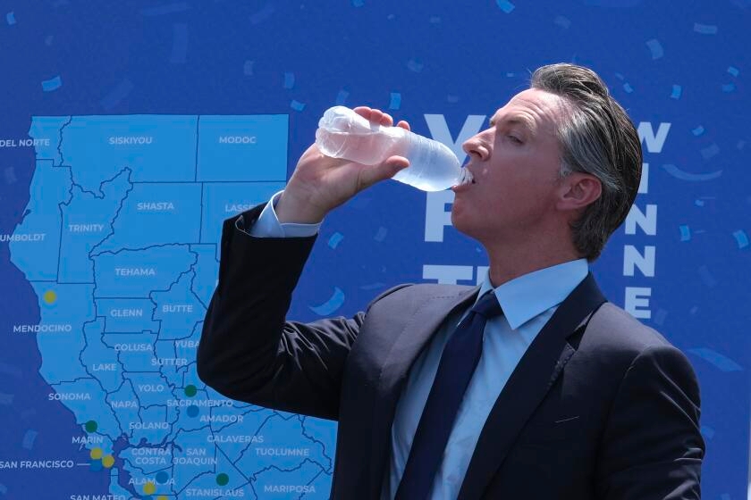 Newsom's podcast sidekick: a single-use plastic water bottle