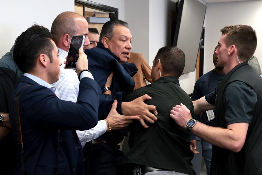 Photographer captures Sen. Alex Padilla's takedown at Homeland Security press conference