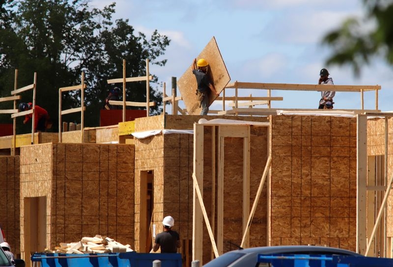 Canadian home sales rise, prices flat in May on a monthly basis
