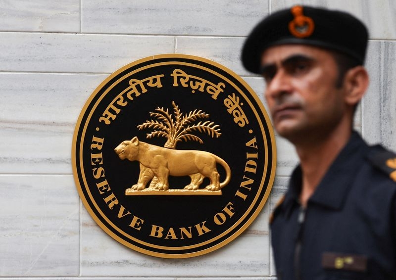India central bank's large rate cut squeezes forward premiums, leaves rupee vulnerable, analysts say