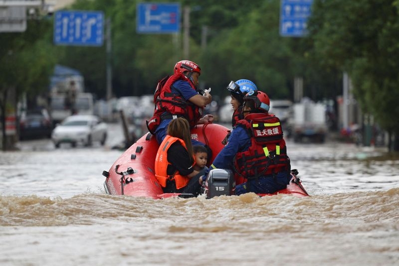 China warns of extensive flooding after heavy rains