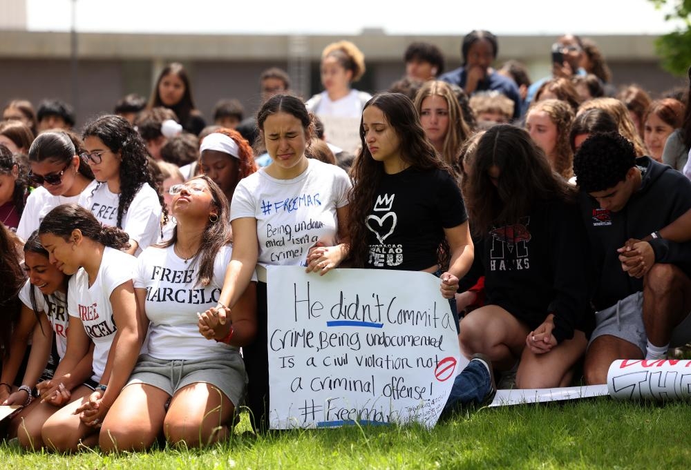 Massachusetts students and teachers protest teen's ‘inhumane' arrest by Ice