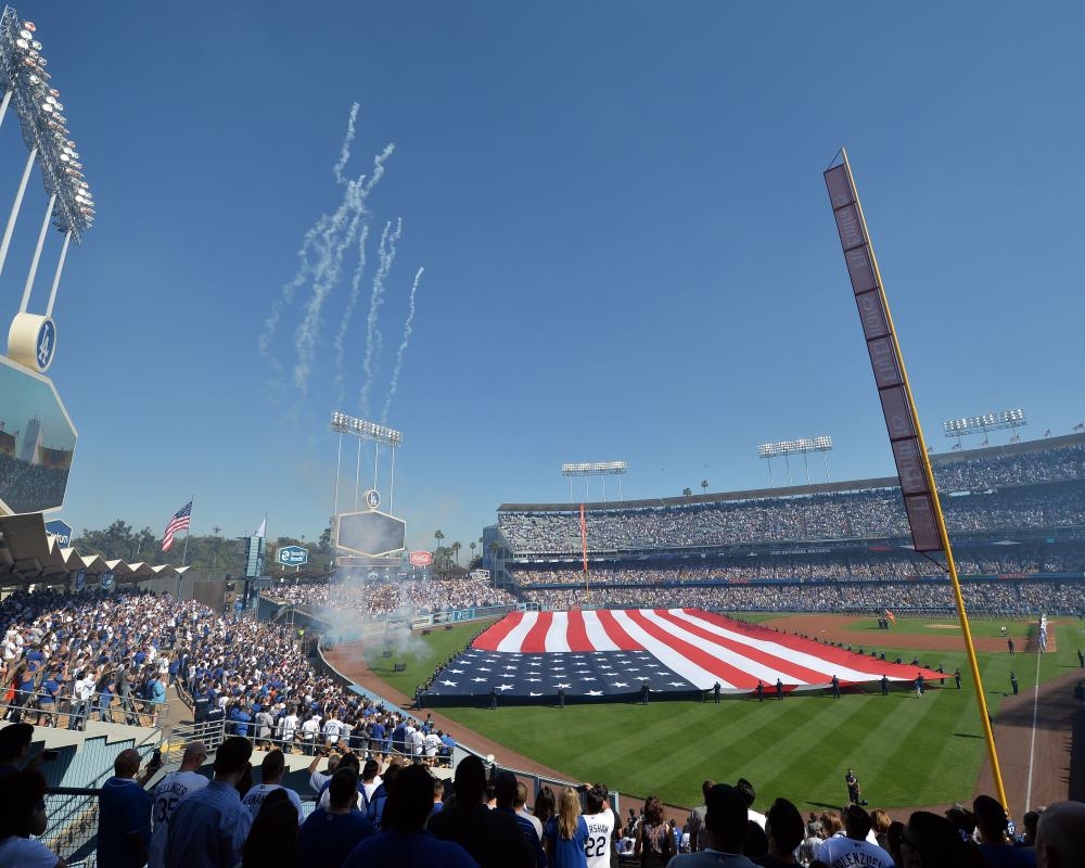Nezza sings national anthem in Spanish at Dodgers as protest against immigration raids