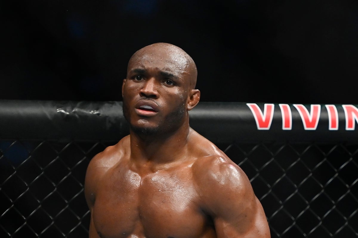 Kamaru Usman fights back tears after beating Joaquin Buckley to earn first UFC win since 2021