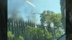 Smoke Pours Into Sky After Fire Breaks Out at Disneyland Parking Structure