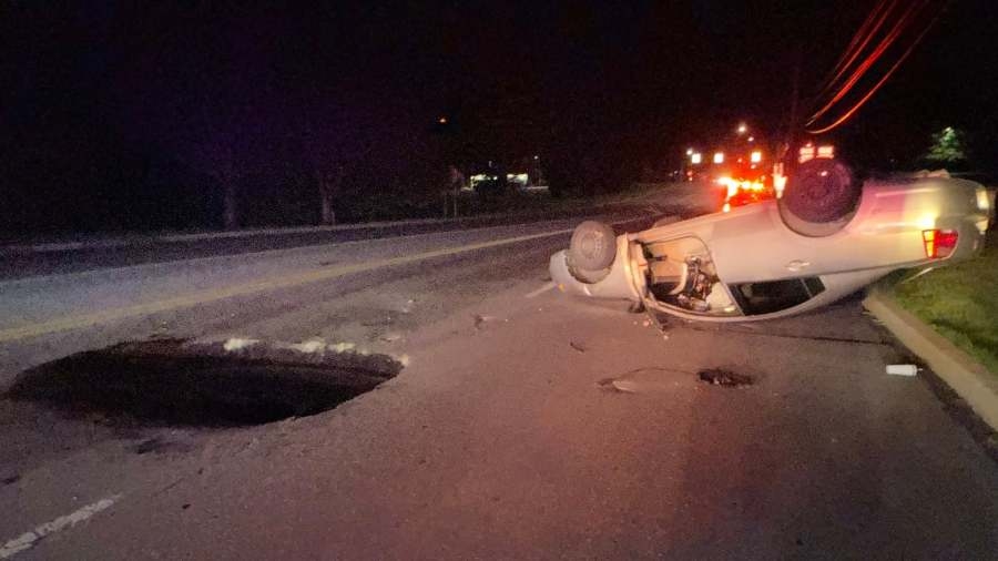 Large sinkhole flips vehicle on Central Pennsylvania roadway