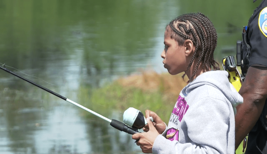 ‘Kids just being kids': Officers invite Akron youth to day of fishing, fun