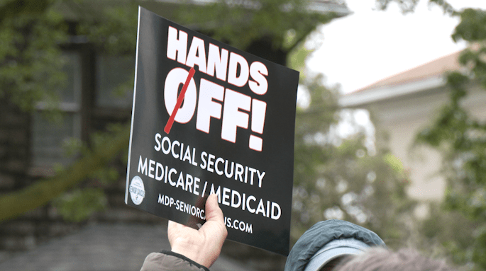 Medicaid cuts bring protesters to Barrett's Lansing office