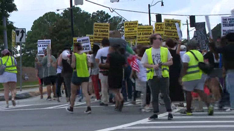 Hundreds march in 'Hands Off' protest in Georgia