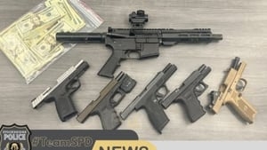 Fake debit cards, guns found during search warrants in Stockbridge neighborhood
