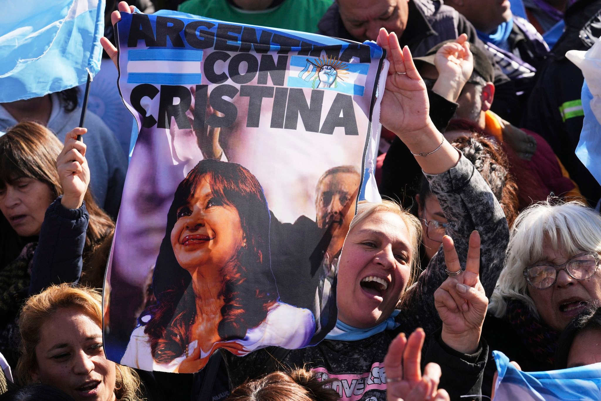 Photos of Cristina Fernández supporters as she serves a prison sentence for corruption in Argentina
