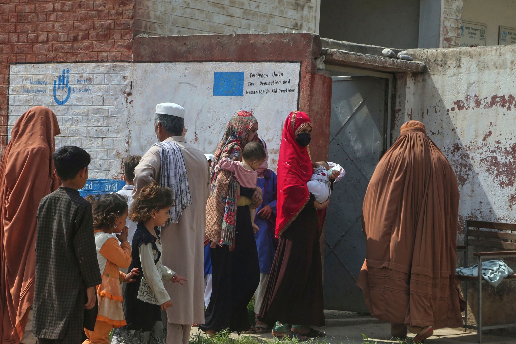 Thousands of Afghans are fleeing Iran every day to escape war and deportation