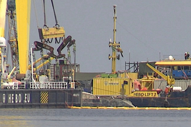 Superyacht is pulled from the seabed 10 months after sinking off Sicily