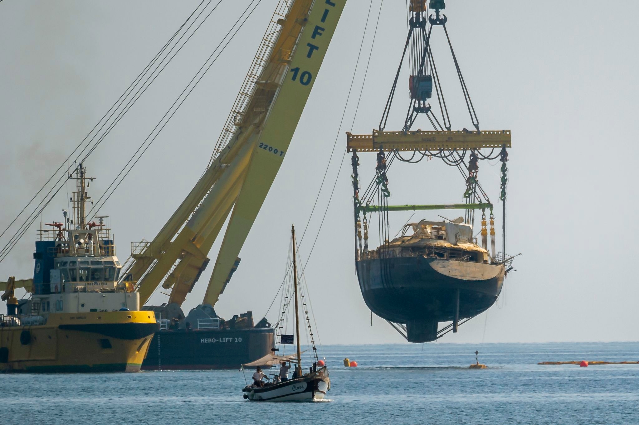 The recovered Bayesian superyacht transferred to Sicilian port on its final journey