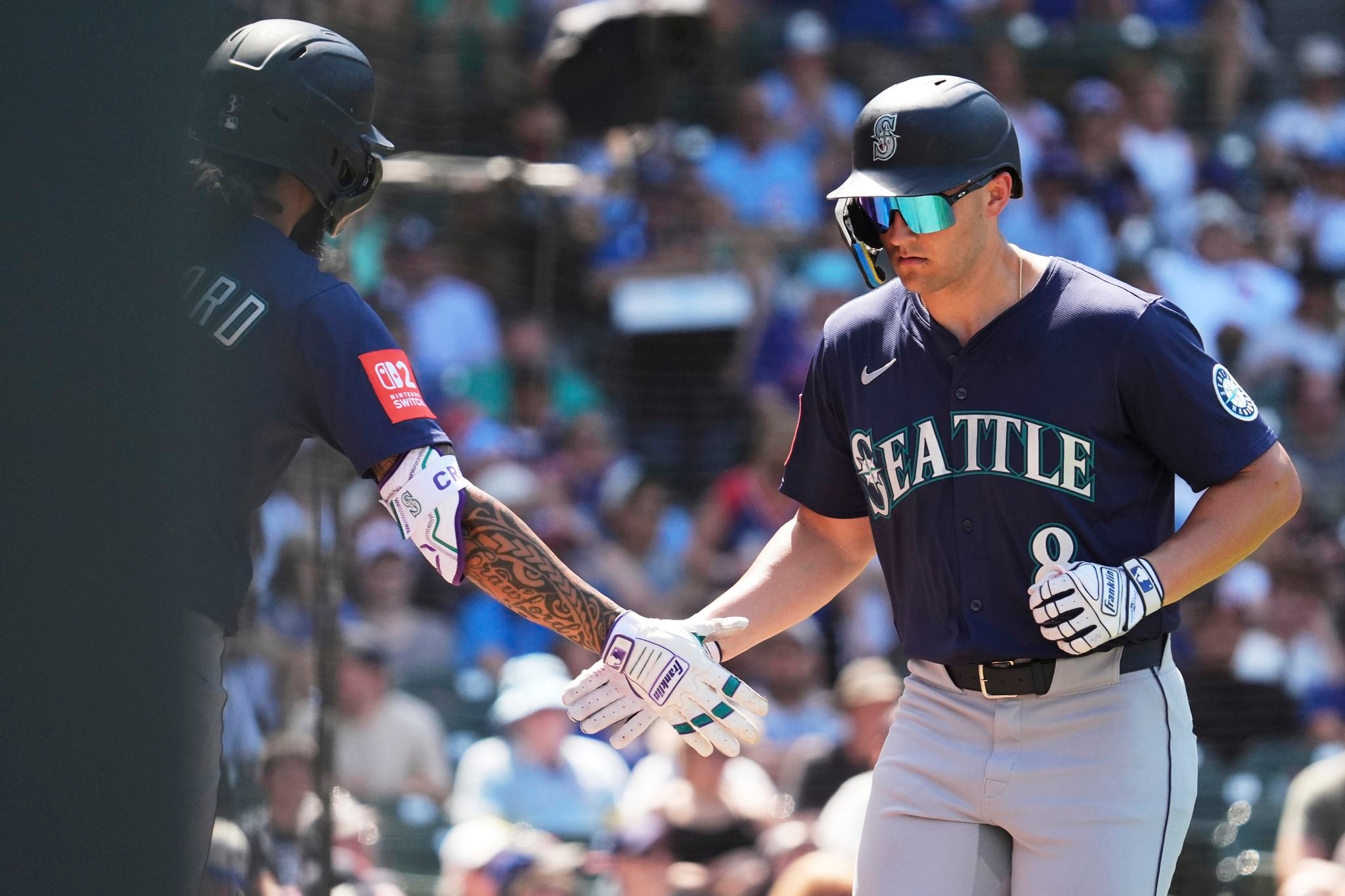 Donovan Solano hits 2 homers as the Seattle Mariners beat the Chicago Cubs 14-6