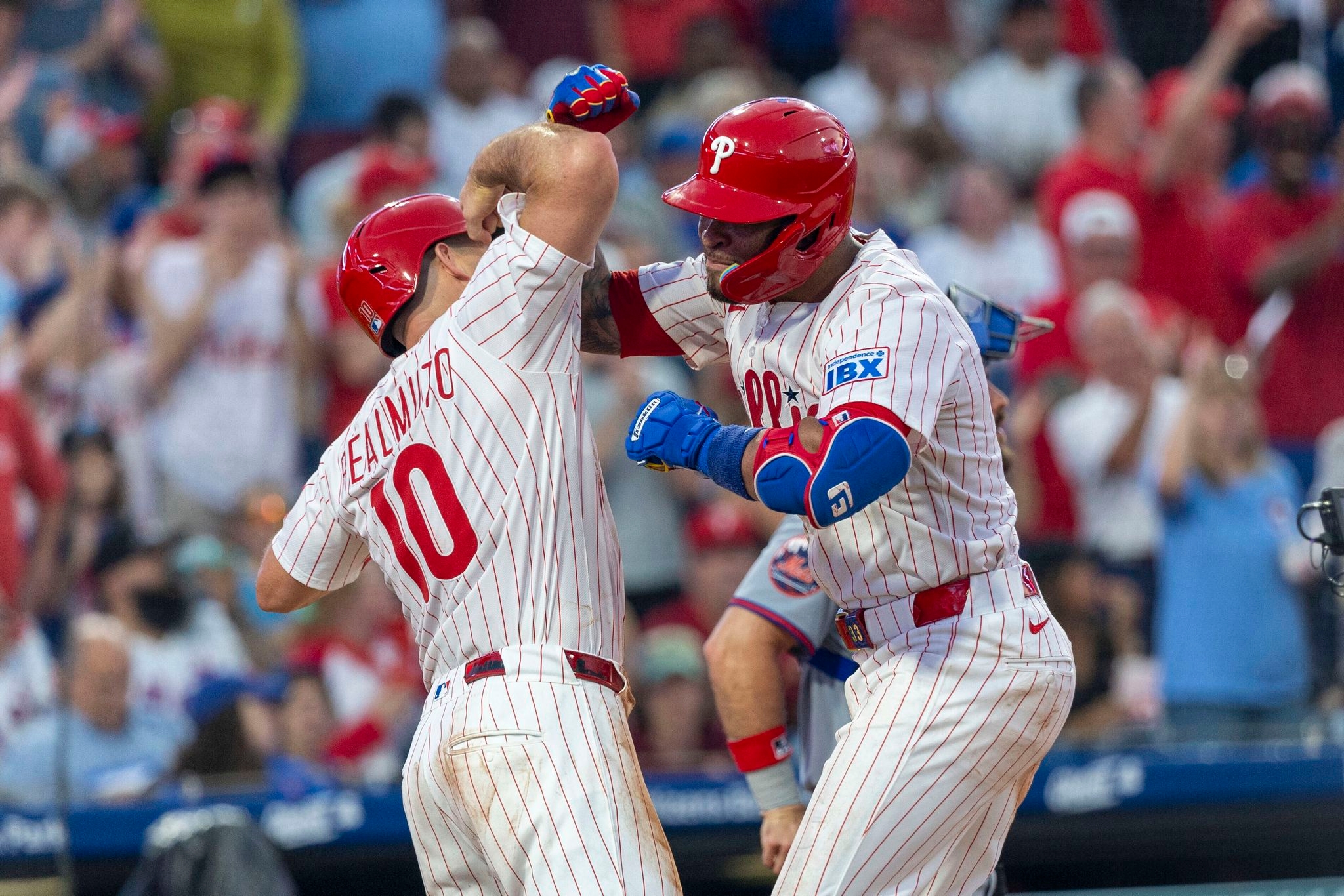 Phillies beat Mets 7-1 to reclaim first place in NL East
