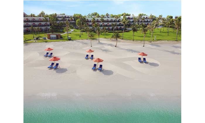 Soak Up the Serenity at JA Palm Tree Court's Beachfront Hideaway
