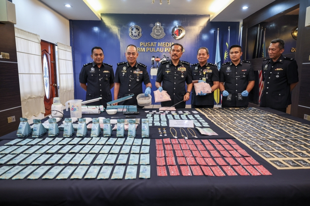 Police uncover courier-assisted drug ring in Penang, seize RM2.1m in narcotics as suspect used juice boxes for MDMA distribution