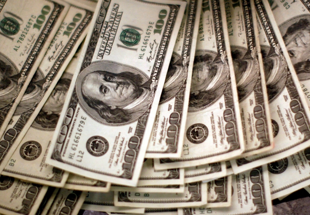 Dollar holds steady after US, China reach framework deal to ease export curbs