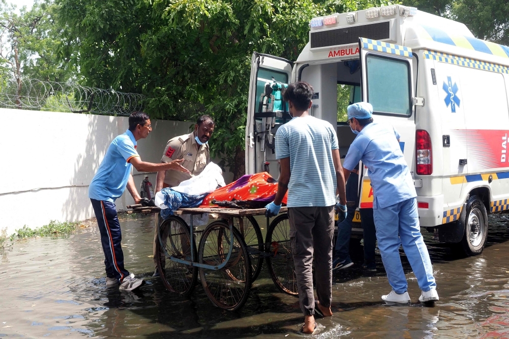At least 30 bodies recovered as rescue efforts continue at Air India crash site in Ahmedabad