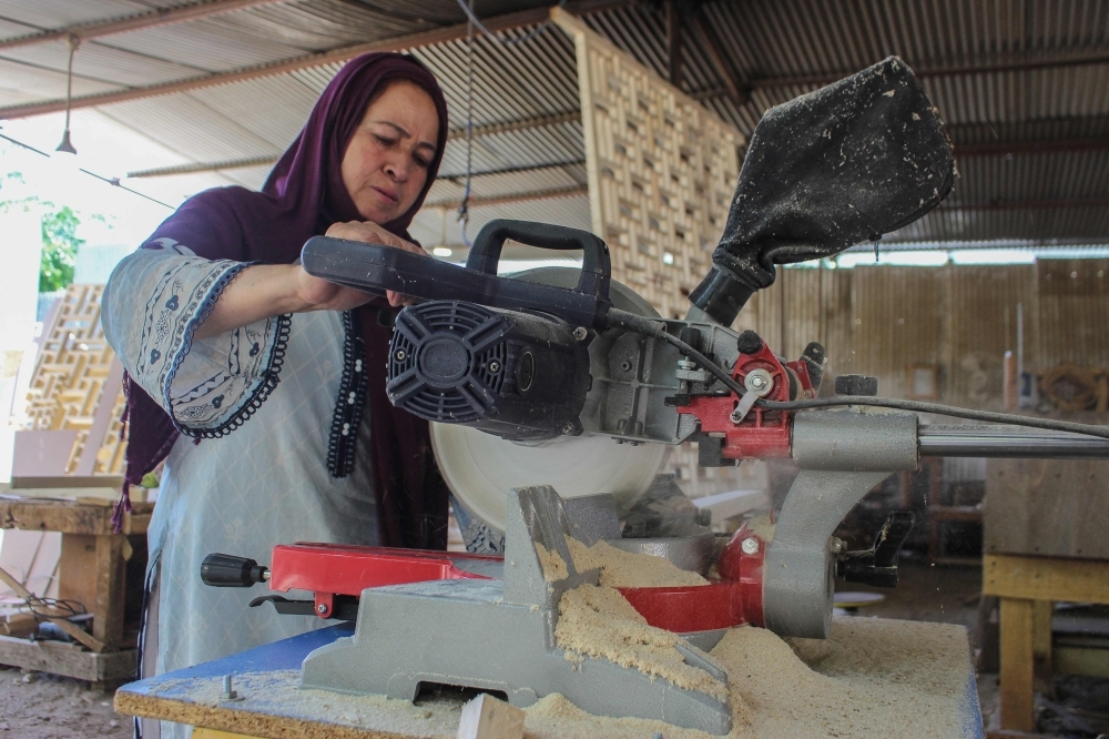 Songs of sawdust and strength among Hunza women in Pakistan's Karakoram Mountains