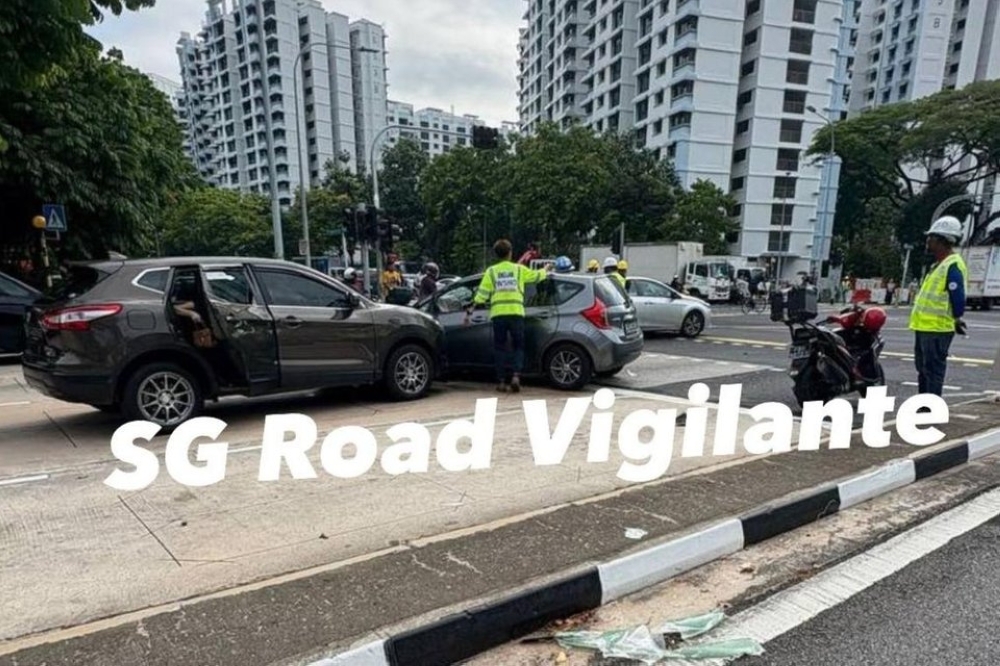 Eight-year-old among three injured in Singapore crash involving motorcycle and two cars