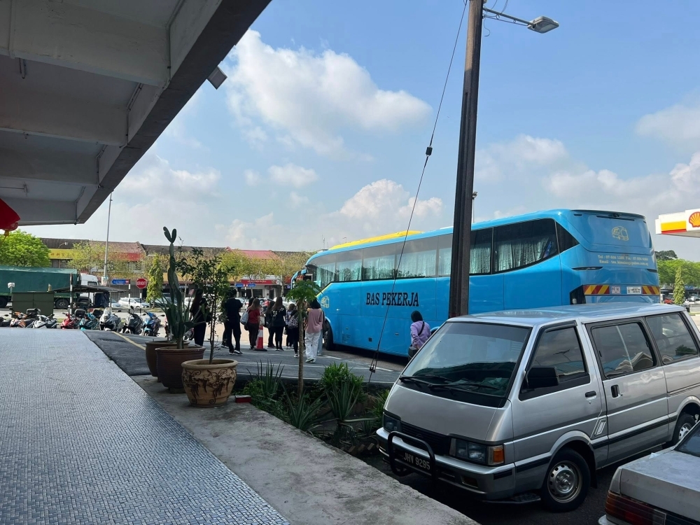 Packed bays, stalled trade: JB businesses suffer as Singapore-bound workers hog city parking from dawn to night