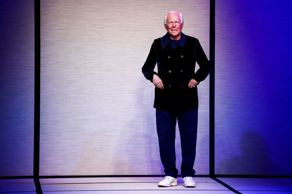 Giorgio Armani sits out Milan Men's Fashion Week for the first time in his career, recovering at home