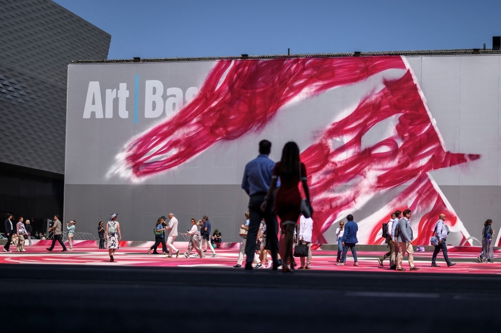 Basel's art fair marches toward utopia — dragging democracy's ghosts along